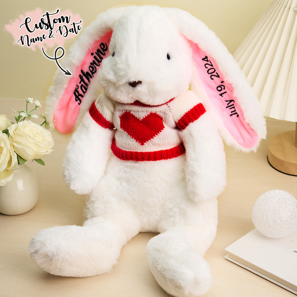 Personalized white bunny plush toy with embroidered name and red heart sweater, a unique gift for children