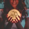 Custom photo lunar lamp held by person, displaying a family photo, perfect Christmas gift