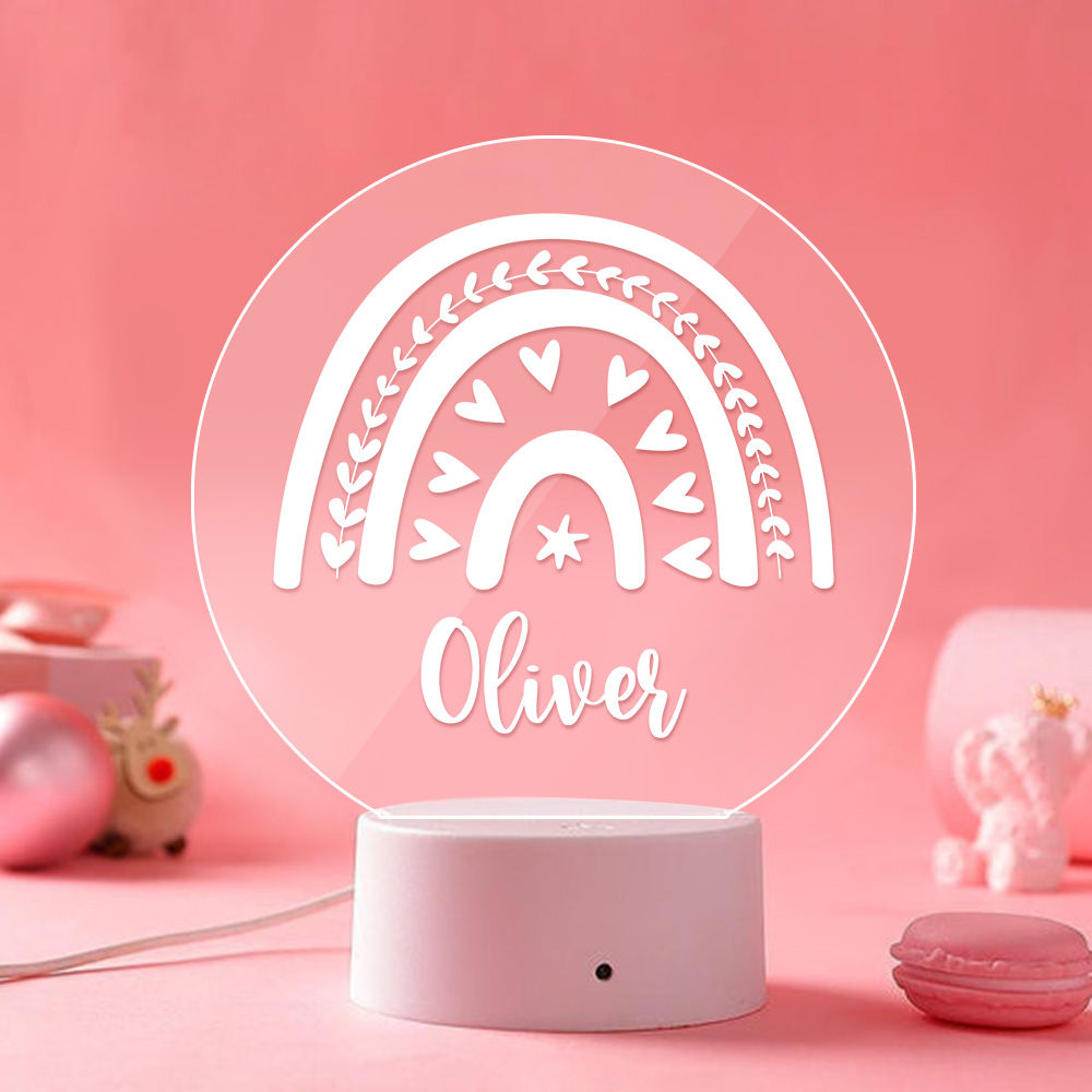 Personalized acrylic rainbow night light for nursery, with custom name "Oliver", LED bedside lamp decor.