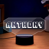 Custom LED gaming sign with 'ANTHONY' text, white light on a clear acrylic plaque, black base, perfect gamer gift.