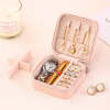 Pink PU leather travel jewelry organizer, with watch, ring, earrings, necklace storage, perfect for gifts.