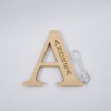 Personalized 'A' wooden night light with 'ANDREA' name, emitting warm LED glow, home decor, 28cm.
