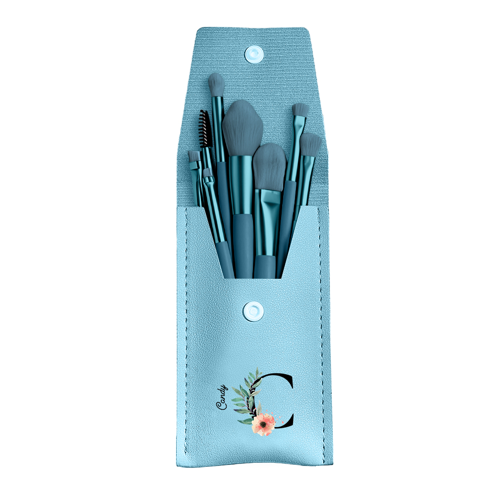 Personalized flower PU leather makeup brush bag set in light blue, includes 8 makeup brushes.