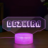 Custom DEZKIRA gaming LED sign, white text on clear acrylic, purple base, perfect gamer gift and room decor.