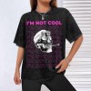 Black vintage wash off-shoulder short-sleeved T-shirt with skull graphic, I'M NOT COOL text, cotton