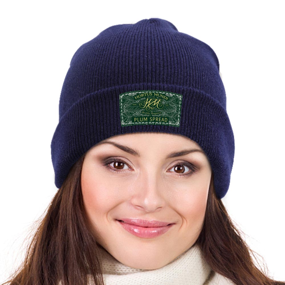 Navy knitted cap with custom logo on a woman, perfect for winter warmth and branded style.