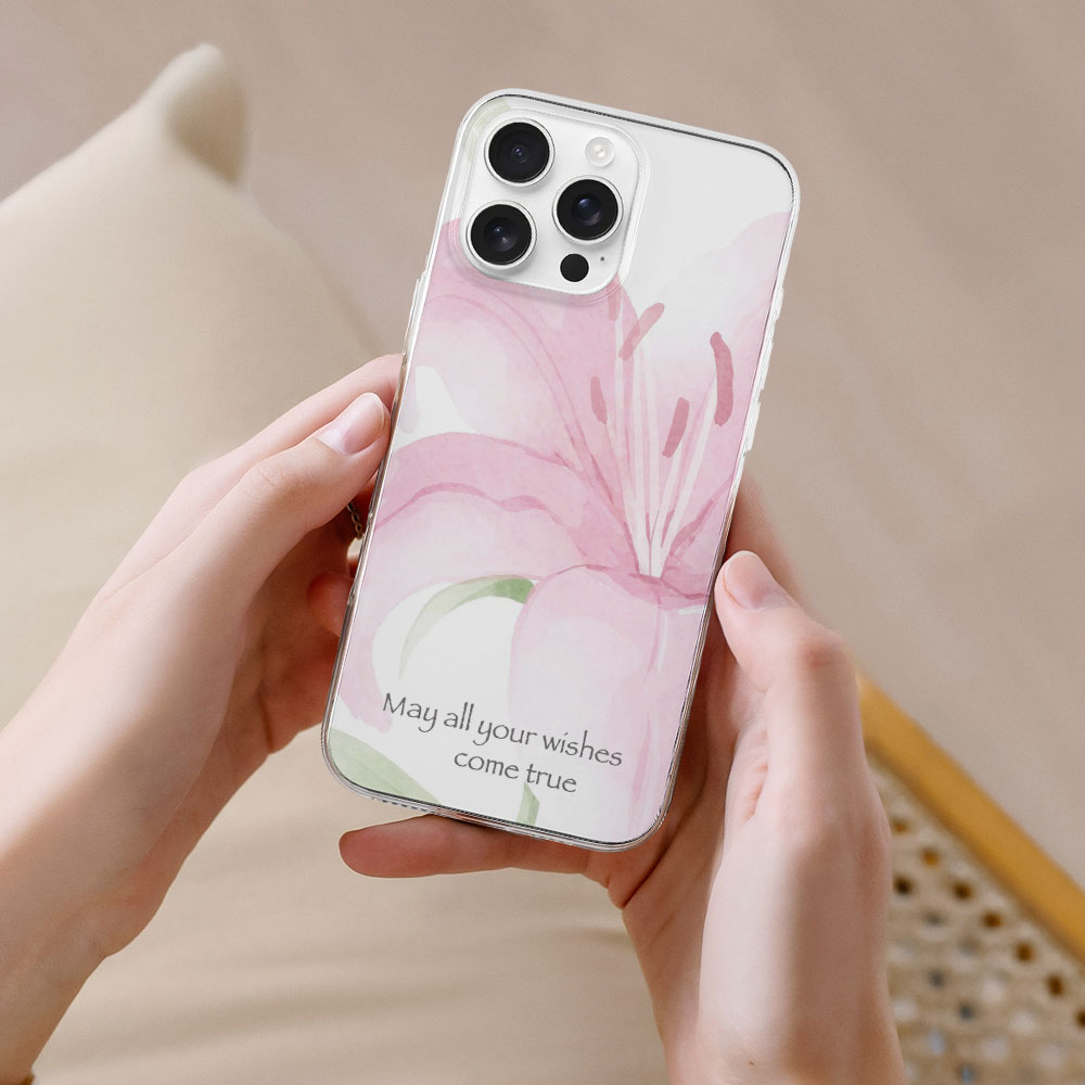 iPhone 16 case with pink watercolor floral design, "May all your wishes come true" text, TPU protective cover