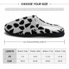 Cotton slippers size chart. White and black spotted indoor slippers with rubber sole, size information displayed.