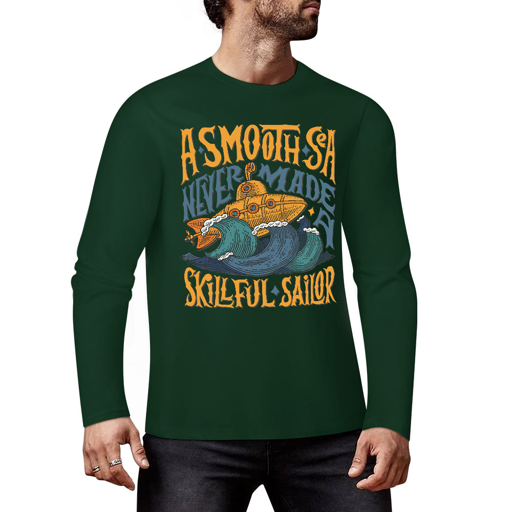 Green pure cotton long sleeve T-shirt featuring ASMODUS Shark Attack graphic for casual wear.