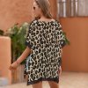 Loose short sleeve beach swim cover with leopard print, V-neck and side slits, perfect for swimwear.