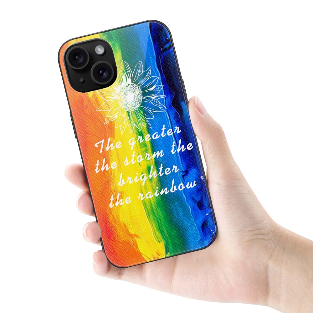 iPhone 15 case with rainbow design and quote, glass and TPU material