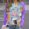 Raglan round neck sweater with cartoon donut print and purple sleeves. Comfortable polyester-cotton blend.