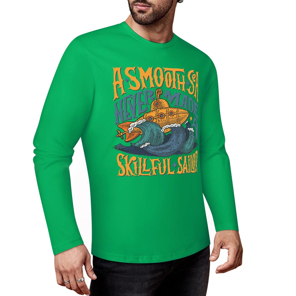 Green pure cotton long sleeve T-shirt featuring ASMODUS Shark Attack graphic for casual wear.