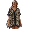Leopard print beach cover-up with lace trim, perfect for stylish swimwear and beachwear.