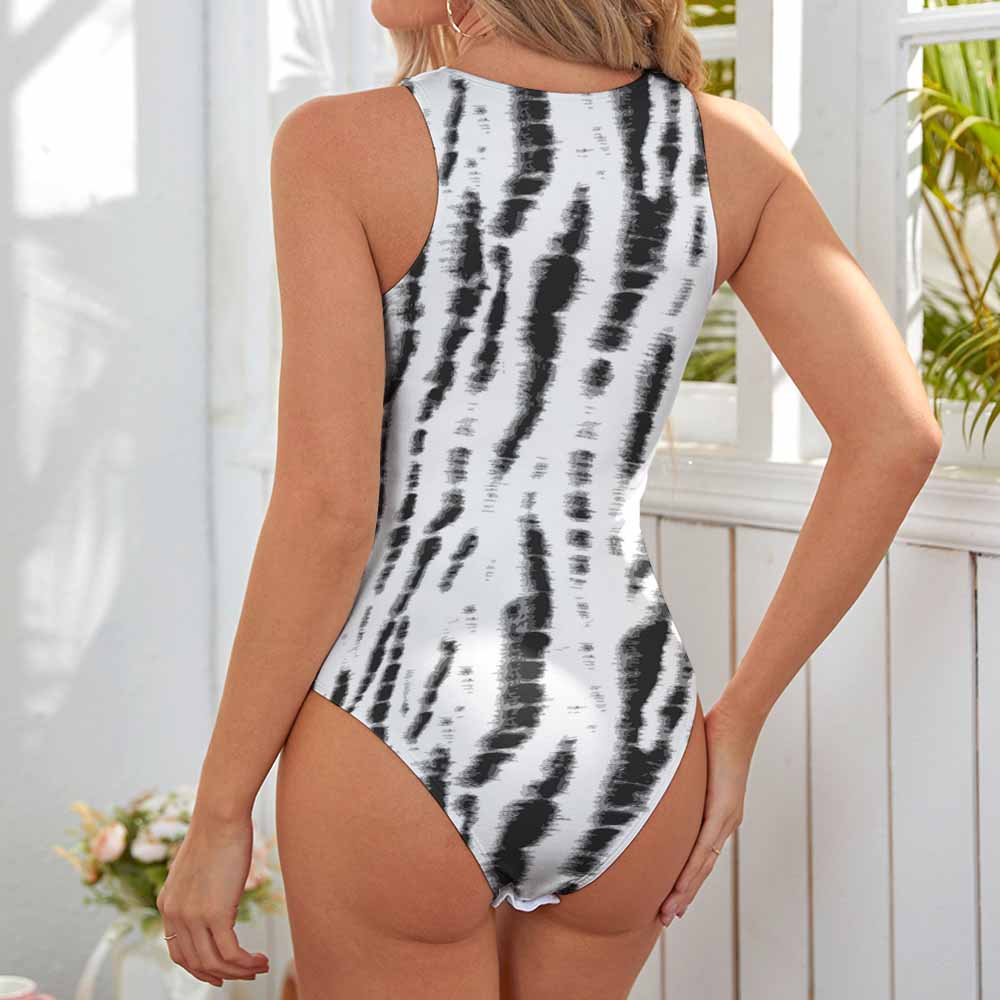Sleeveless vest jumpsuit with black and white print, perfect for versatile styling.