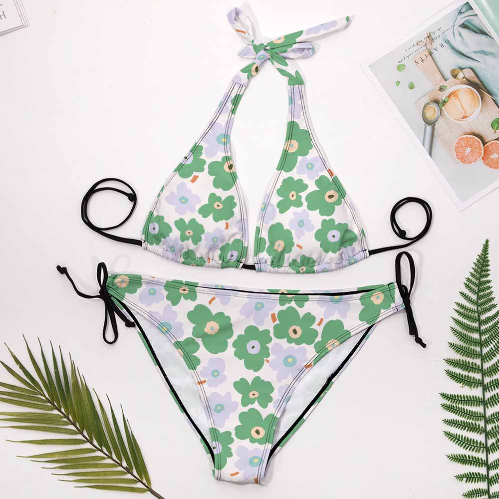Plus size floral bikini swimsuit with adjustable straps, perfect for beach vacation.