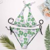 Plus size floral bikini swimsuit with adjustable straps, perfect for beach vacation.