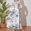 Plus size long sleeve dress with floral print, featuring a crew neck design and loose fit for all-season wear.