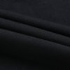 Black hoodie sweatshirt fabric detail, cotton blend fleece, comfortable fit for women's apparel.