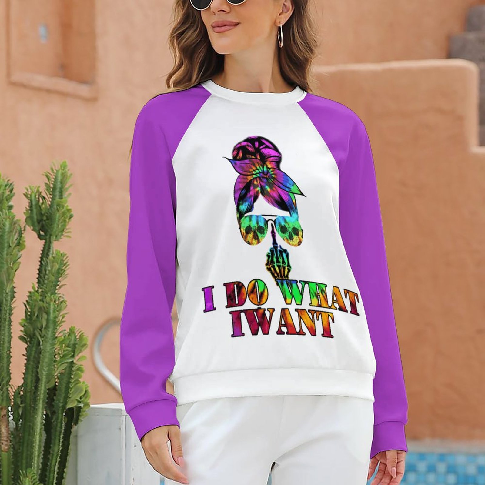 Raglan sweater with "I DO WHAT I WANT" print, purple sleeves. Comfortable polyester-cotton blend for casual wear.