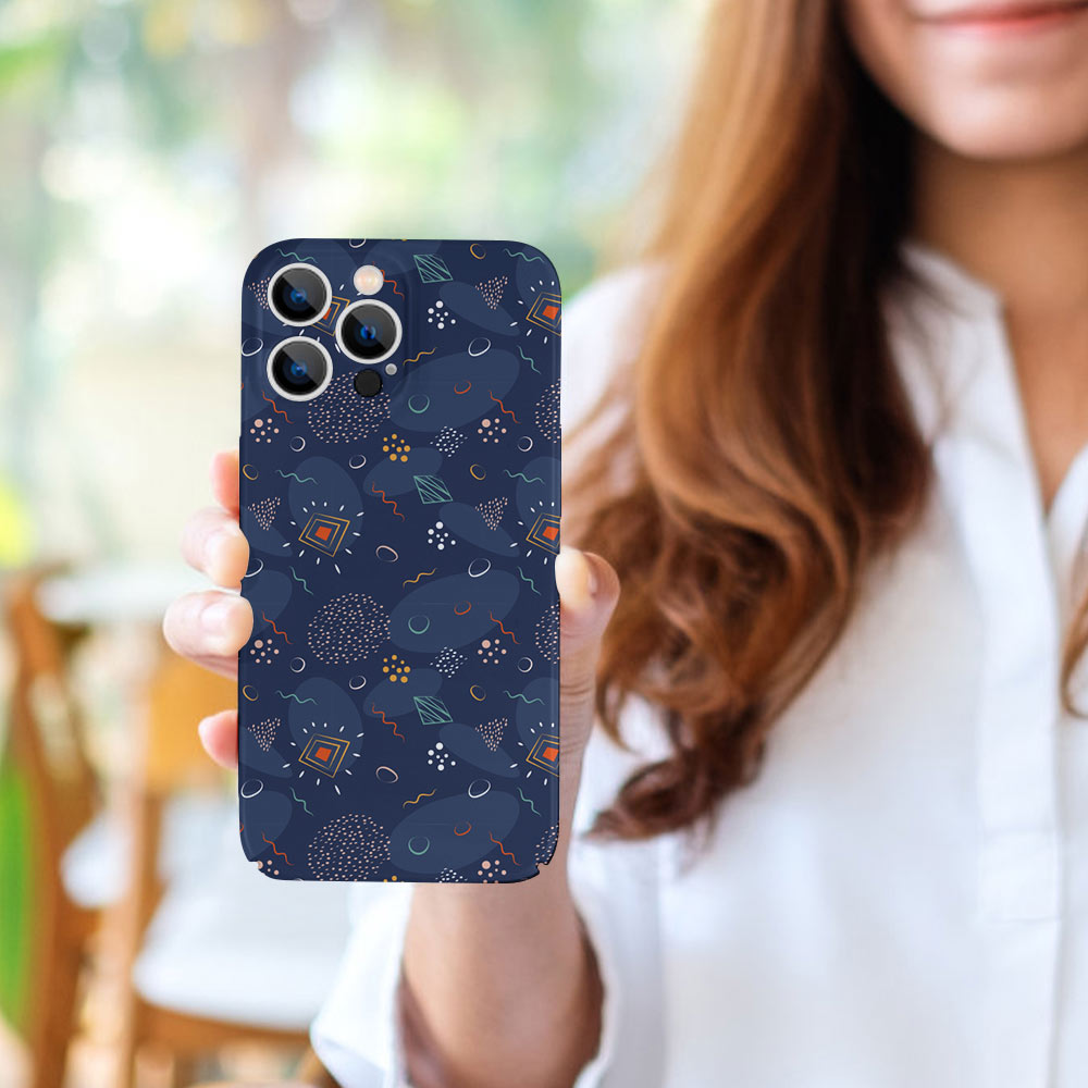 Woman holding an iPhone 13 case with a dark blue celestial pattern, PC plastic phone protector