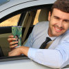 Man in car with 20 oz stainless steel travel coffee mug, perfect for car and outdoor use.