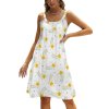 White beach sling skirt with yellow floral pattern, perfect for vacation