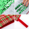 Christmas stocking detail: sequin texture with plaid trim, perfect holiday decor