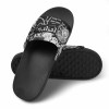 Black PVC home slippers with pattern for home, beach and pool, durable and comfortable.