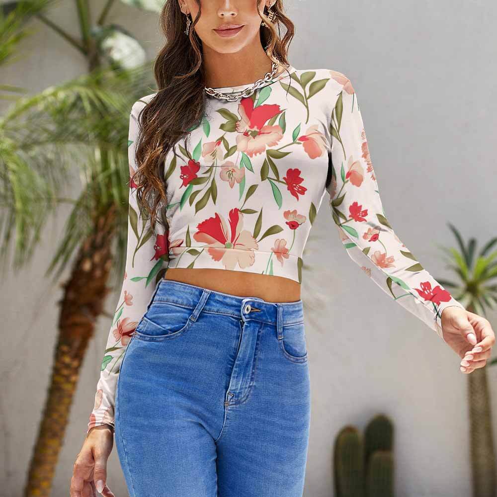 Floral print backless crop top with long sleeves and tie back design, paired with jeans