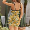Yellow floral print sling dress, slim fit design with adjustable straps, perfect for parties and casual wear.