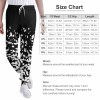 Black and white patterned polyester sweatpants size chart, with detailed waist, hips, and length measurements.