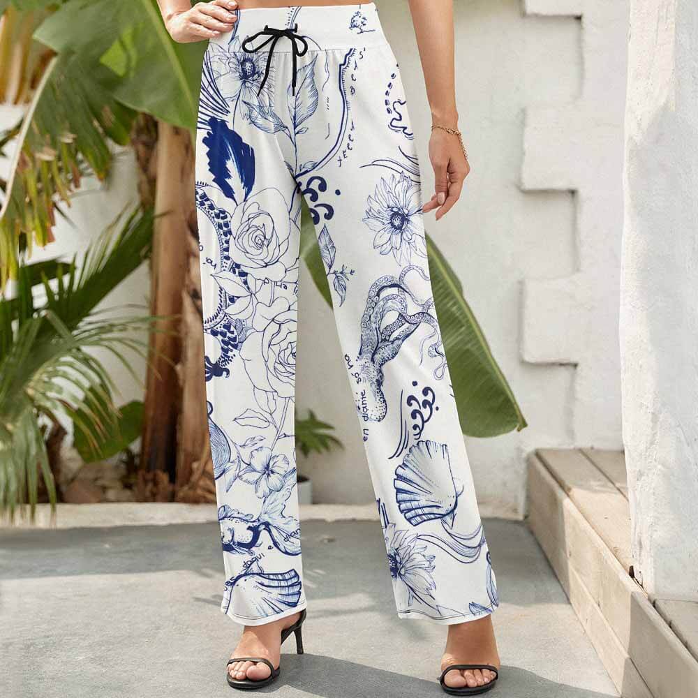 Blue floral wide-leg pants for women, elastic waist, Inkedjoy. Comfortable, stylish.