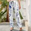 Blue floral wide-leg pants for women, elastic waist, Inkedjoy. Comfortable, stylish.