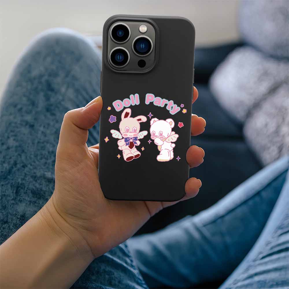 iPhone 13 case featuring 'Doll Party' design with bunny and bear characters, black TPU, wireless charging compatible.