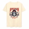 Cream cotton T-shirt with "AMERICAN LEGEND" gorilla graphic print, summer fashion.