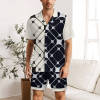 Men's ice silk pajama set, geometric print in black and white. Comfortable V-neck short-sleeved top and shorts for sleep.