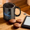 Black ceramic mug with 'Space' design, featuring a space-themed graphic. Perfect for gifting or personal use.