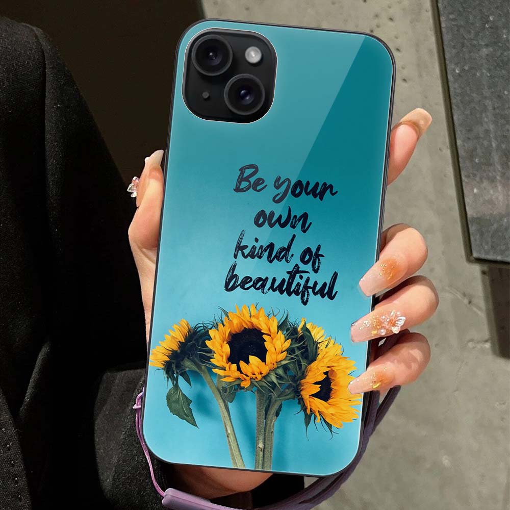 iPhone 15 case with sunflowers and quote 'Be your own kind of beautiful', glass + TPU material
