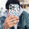 iPhone 16 Fiber Skin Case with abstract blue floral pattern, protective and stylish cover.