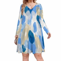 Oversized V-neck dress with abstract blue and beige pattern, made of soft polyester and spandex blend.