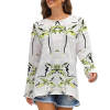 White long sleeve crew neck t-shirt with green pattern, comfortable polyester-cotton blend.