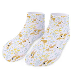 White socks with yellow patterns, comfortable and sweat-wicking, suitable for all seasons.