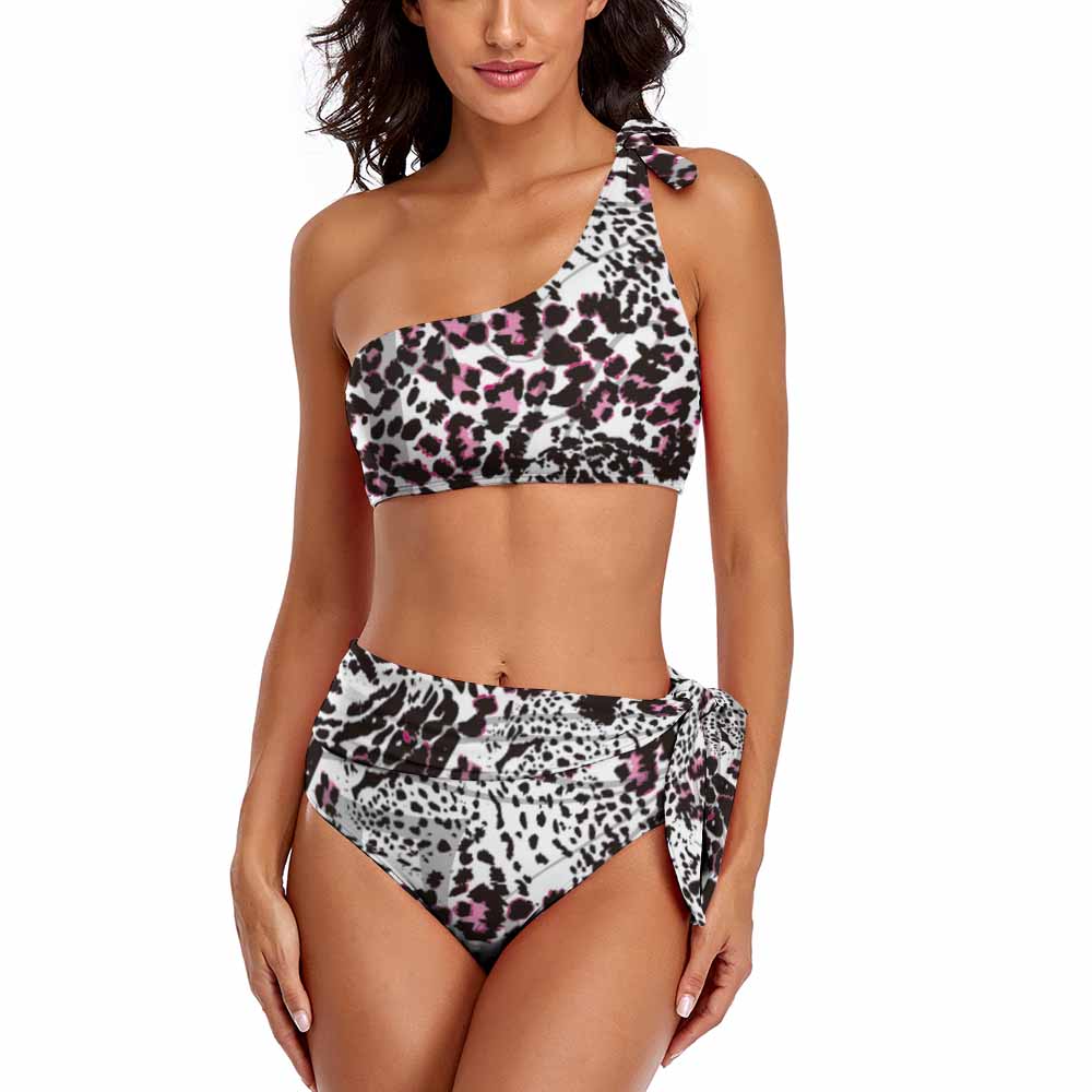 Women's black and white floral one-shoulder bikini swimsuit. High-waisted design, perfect for beach and pool parties.