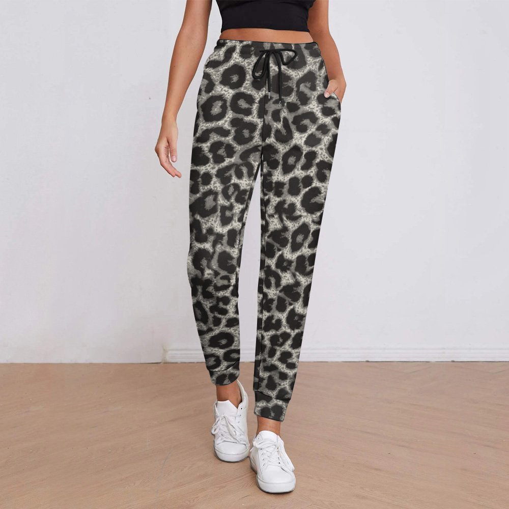Women's leopard print sweatpants with pockets, elastic waistband, and drawstring, casual wear.