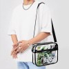 Transparent PVC satchel bag, worn by a person, perfect for work and travel.