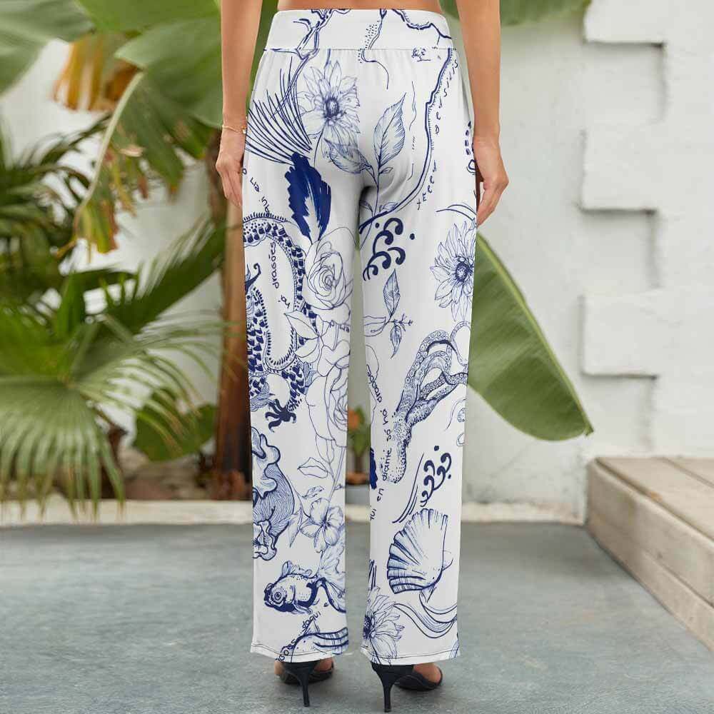 Women's wide-leg pants with white and blue floral print, elastic waist, comfortable and stylish, perfect for casual wear.