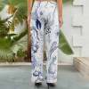 Women's wide-leg pants with white and blue floral print, elastic waist, comfortable and stylish, perfect for casual wear.