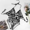 Plus Size Zebra Print Halter Neck Swimsuit. Wrap design for flattering fit, perfect for beach or pool.