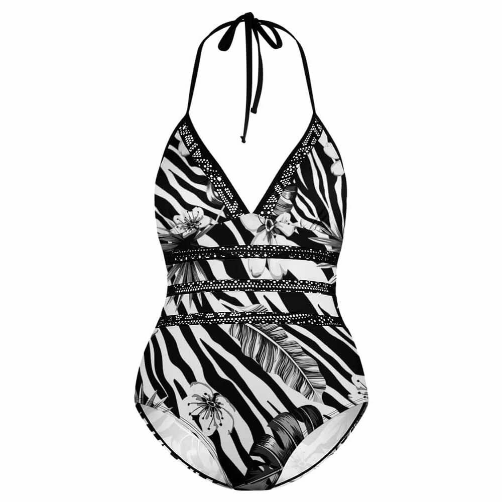 Plus size halter swimsuit with zebra print, wrap design, perfect for beach or pool.